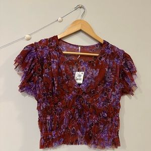 Free People mesh top. Red/purple flower pattern, new with tags. Size M.